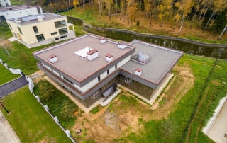 WaterTight Roofing team installing a TPO roofing system on a commercial property, highlighting benefits such as energy efficiency, durability, and cost savings. Call 888-809-9976 today to learn how WaterTight Roofing can improve your commercial property's performance with expert TPO roofing solutions.
