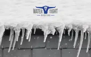 Frozen gutter with water dripping, showing Winter Weather Damage on Commercial Roofs and the need for a post-winter inspection before spring.